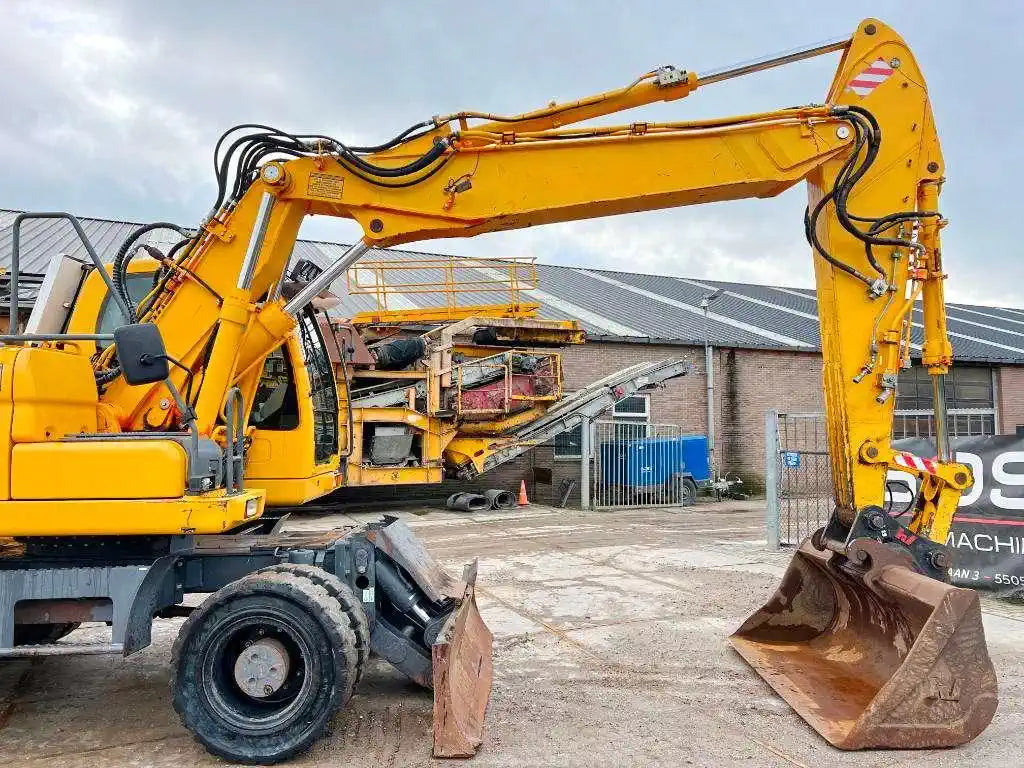 Pelle sur pneus DOOSAN DX190W (ETEC 818) – 18 T + 3 Godets – Garantie 12 mois