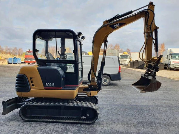 CATERPILLAR 302.5 + TARIERE HYDRAULIQUE + 3 GODETS